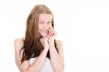 Timid woman shy portrait smiling cute girl with long hair blonde hands closed under chin on white background Royalty Free Stock Photo