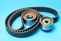 Timing belt with rollers on background .Kit of timing belt for car engine