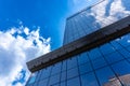 Timisoara,Timis Romania,April 24 2023: Bright clouds reflected in windows of modern office building Royalty Free Stock Photo