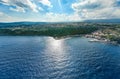 Timpa di Acireale vista aerea dall`alto su Santa Maria la scala con mare e cielo blu