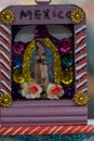 tin or aluminum figure of the virgin mary, religious figure, mexican souvenir mexico Royalty Free Stock Photo