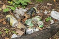 Tin beer and cider cans left as rubbish waste litter