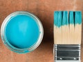 Tin of Blue Paint With a Paint Brush Royalty Free Stock Photo