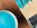 Tin of Blue Paint With a Paint Brush Royalty Free Stock Photo