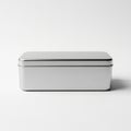 Tin box with smooth rounded edges is centered against a plain white backgroun Royalty Free Stock Photo