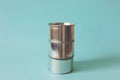 Tin can against light blue background Royalty Free Stock Photo