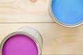 Tin cans of blue and fuchsia oil paint Royalty Free Stock Photo