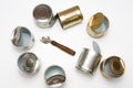 Open cans and a can opener Royalty Free Stock Photo