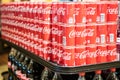 Tin cans of Coca cola sodas for sale Royalty Free Stock Photo