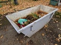 tin container for storing biowaste from a gardening company Royalty Free Stock Photo