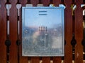 Tin gas box on residentual house wooden fence Royalty Free Stock Photo