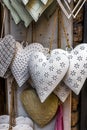 Tin hearts hanging on a window Royalty Free Stock Photo