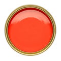 TIN OF BRIGHT RED ORANGE PAINT ON WHITE BACKGROUND