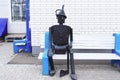 Tin Woodman sitting on a bench Royalty Free Stock Photo