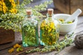 Tincture bottles of tansy and tarragon healthy herbs