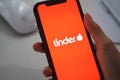 Tinder logo on smartphone screen Royalty Free Stock Photo