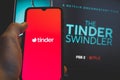 The Tinder Swindler is a new popular Netflix`s documentary about Simon Leviev who scammed women on Tinder app Royalty Free Stock Photo