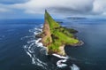 Tindholmur on Faroe Islands Vagar, aerial drone view during day in North Atlantic Ocean. Faroe Islands, Denmark, Europe Royalty Free Stock Photo