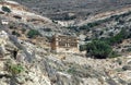 Tinos island Cyclades Greece. Traditional old dovecote, pigeon house on rocky hill, sunny day Royalty Free Stock Photo