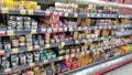 Tins of canned fish for sale in a supermarket