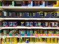 Tins of canned fish on a supermarket shelf