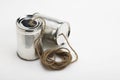 Tins cup telephone with rope connecting on white background Royalty Free Stock Photo