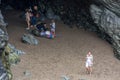 People exploring a cave at Tintagel in Cornwall on August 13, 2013. Unidentified people