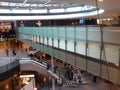 Tinted-Glass Bridge with Passengers, Zurich-Airport ZRH Royalty Free Stock Photo