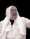 Tinted Portrait of a Very Happy, Laughing Sheik