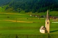 Tiny Alpine Church in Green Field