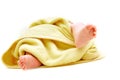 Tiny baby's feet in towel