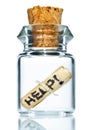 Tiny bottle with help message Royalty Free Stock Photo