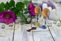 Tiny bottles with tags eat me and drink me, clocks, key and wild roses on planks Royalty Free Stock Photo