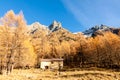 Tiny chalet in the italian Alps with a colourful panorama Royalty Free Stock Photo