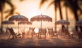 Tiny deck chairs and umbrellas on the beach