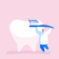 Tiny Dentist Doctor Character Care of Huge Tooth Carry Brush with Toothpaste. Caries Prevention and Treatment Royalty Free Stock Photo