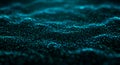 Tiny dots of blue and green light create a dynamic wave pattern on a dark Royalty Free Stock Photo