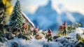 Tiny elves working in a snowy mountain landscape Royalty Free Stock Photo