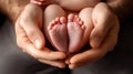 Tiny feet held in loving hands Royalty Free Stock Photo