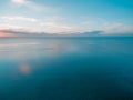 Fishing boat sailing across calm sea. Royalty Free Stock Photo