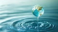 A Tiny Globe Dropping Into The Water Royalty Free Stock Photo