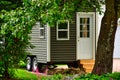 Tiny gray mobile home for glamping Royalty Free Stock Photo