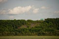 Tiny green house on the hill