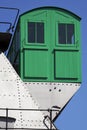 Tiny green house on a steel construction