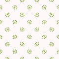Tiny green leaves polka dots . Hand drawn seamless vector pattern illustration