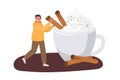 Tiny guy cooking creamy hot drink with cinnamon and anise. Man putting cinnamon into drink. Flat Vector Template of