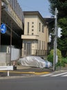 Tiny house in Tokyo, Japan. House close to railway tracks. Royalty Free Stock Photo