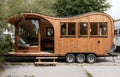 Tiny house on wheels parked outside ready for adventure, alternative living concept