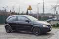 Small black German car Opel Astra parked Royalty Free Stock Photo