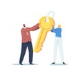 Tiny Male and Female Characters Holding Huge Golden Key. Business Motivation, Complicated Task Solution, Safety Royalty Free Stock Photo